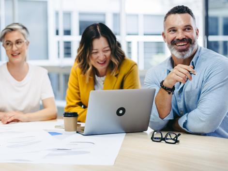 Cheerful design professionals having a meeting in an office