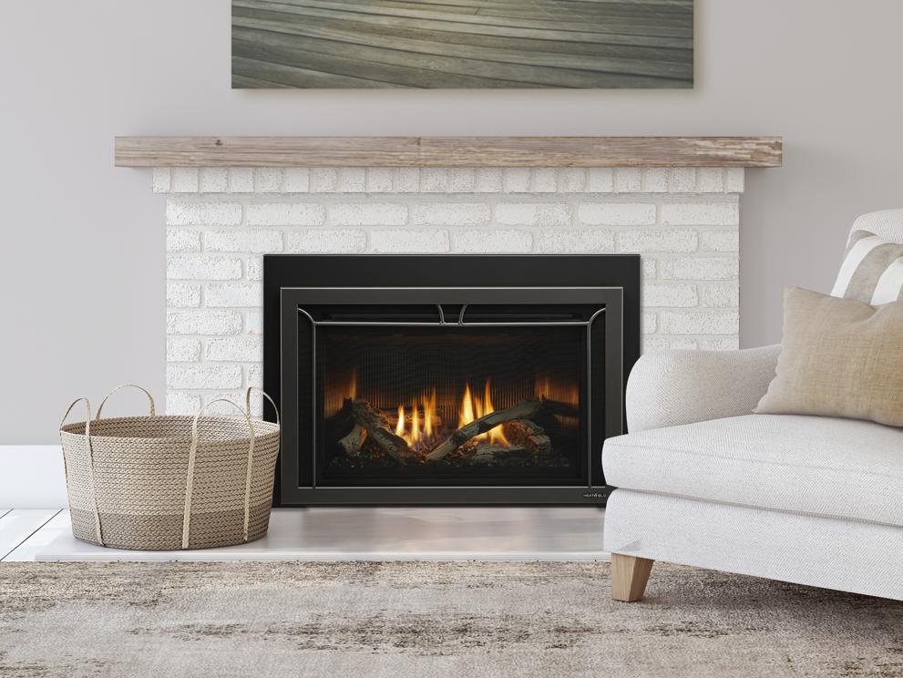 heat & glo cosmo gas fireplace insert shown in a living room setting